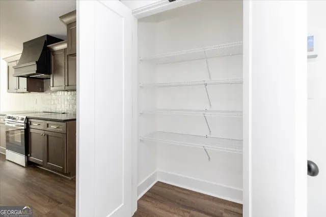 a view of a kitchen with a sink and dishwasher