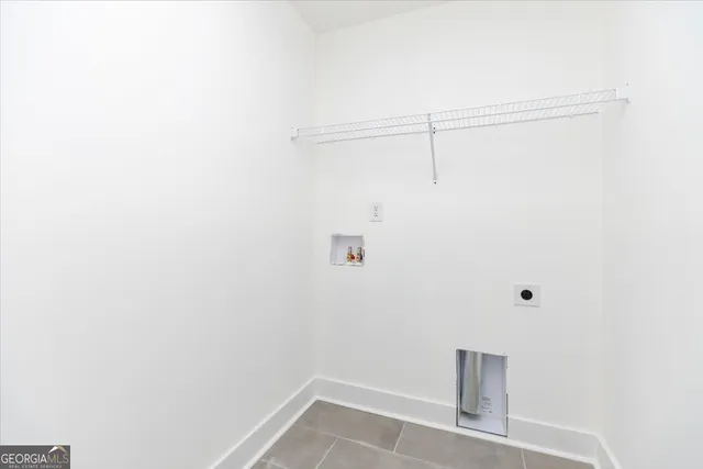 a view of small space with racks on the wall