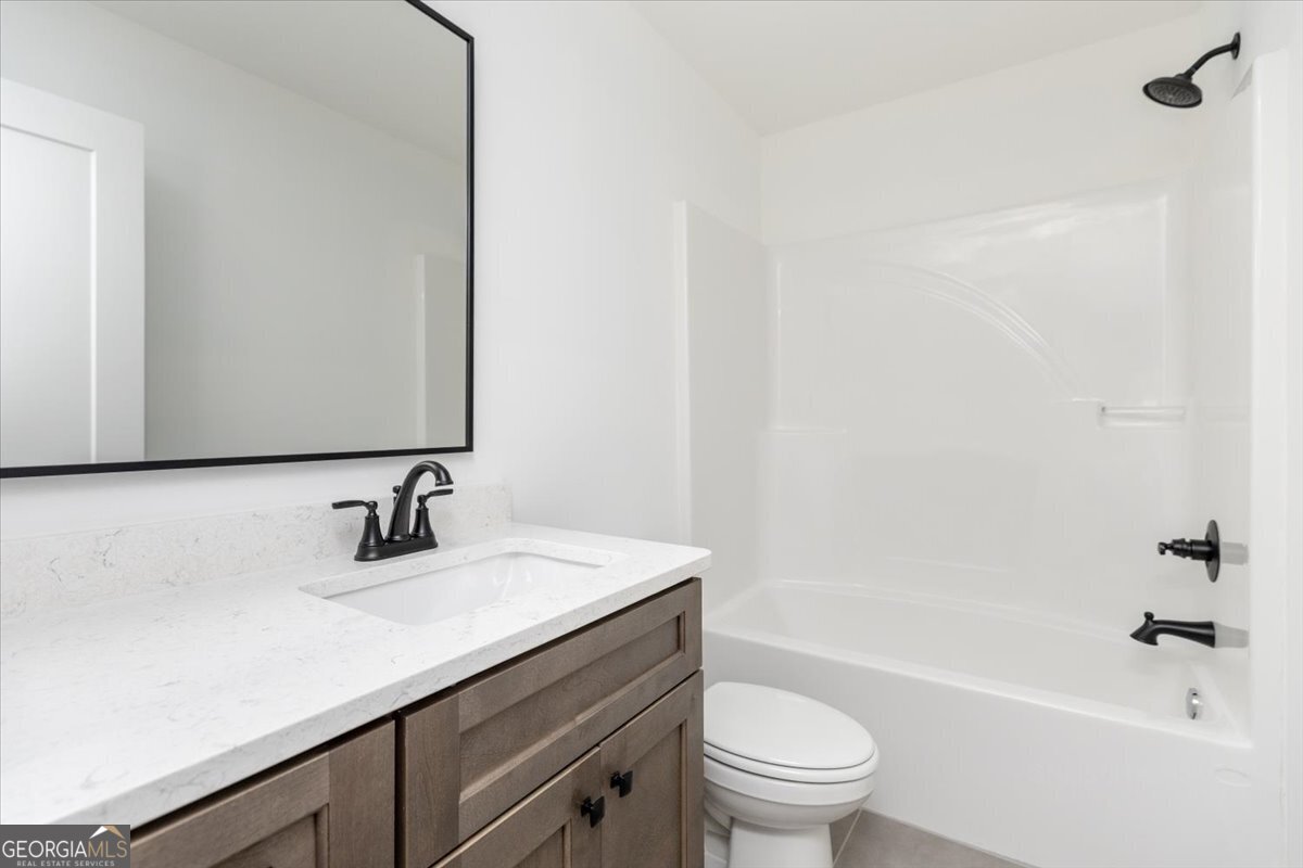 506 New Hope Drive Perry, GA 31069 - Photo 38 of 51 a bathroom with a sink toilet and shower