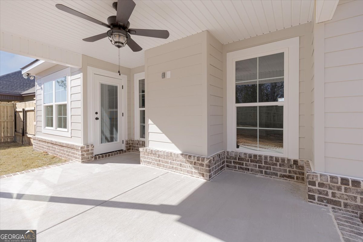 506 New Hope Drive Perry, GA 31069 - Photo 46 of 51 a front view of a house with a yard and garage