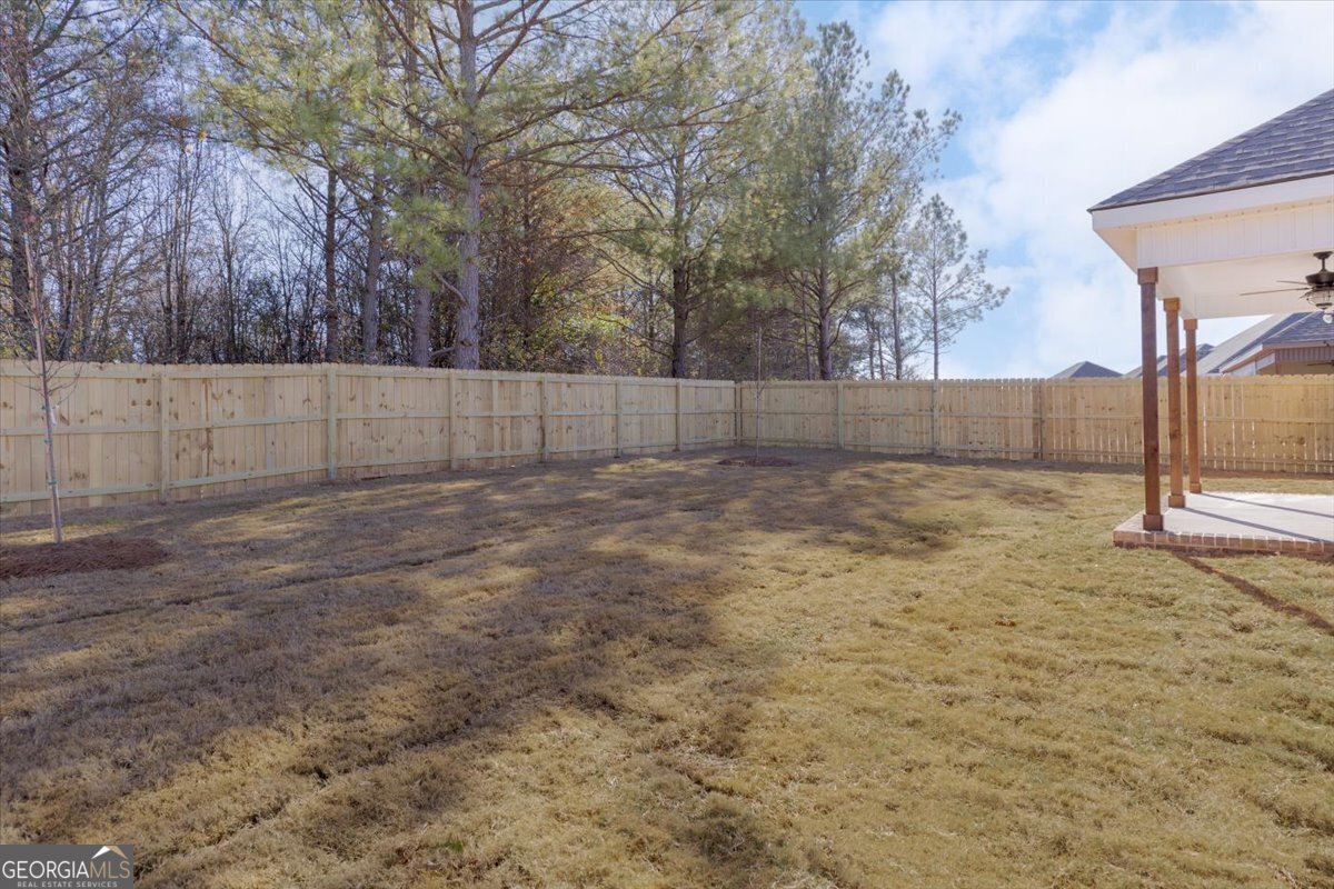 506 New Hope Drive Perry, GA 31069 - Photo 50 of 51 a view of backyard and tree