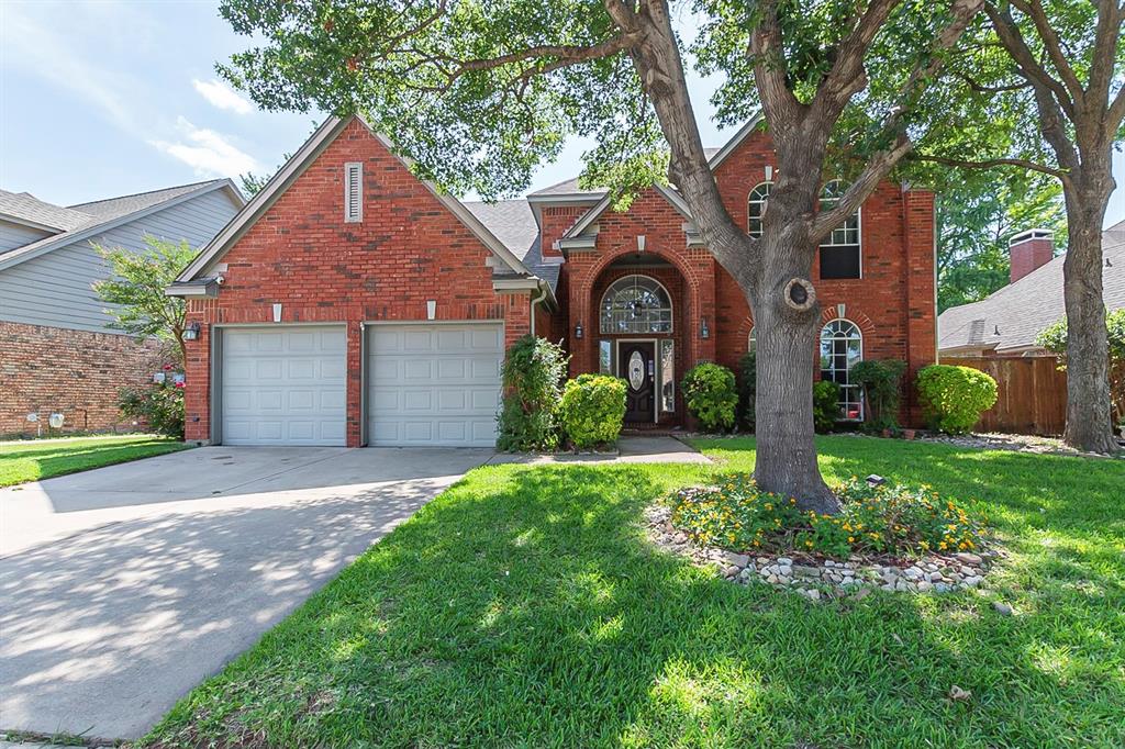 2214 Cherry Hill Lane McKinney, TX 75072 - Photo 1 of 1 a front view of a house with garden