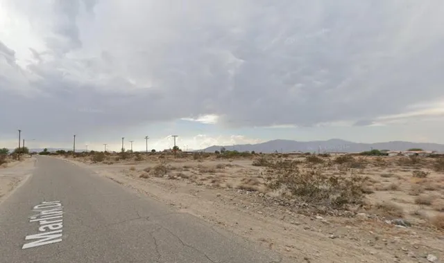 a view of ocean and mountain