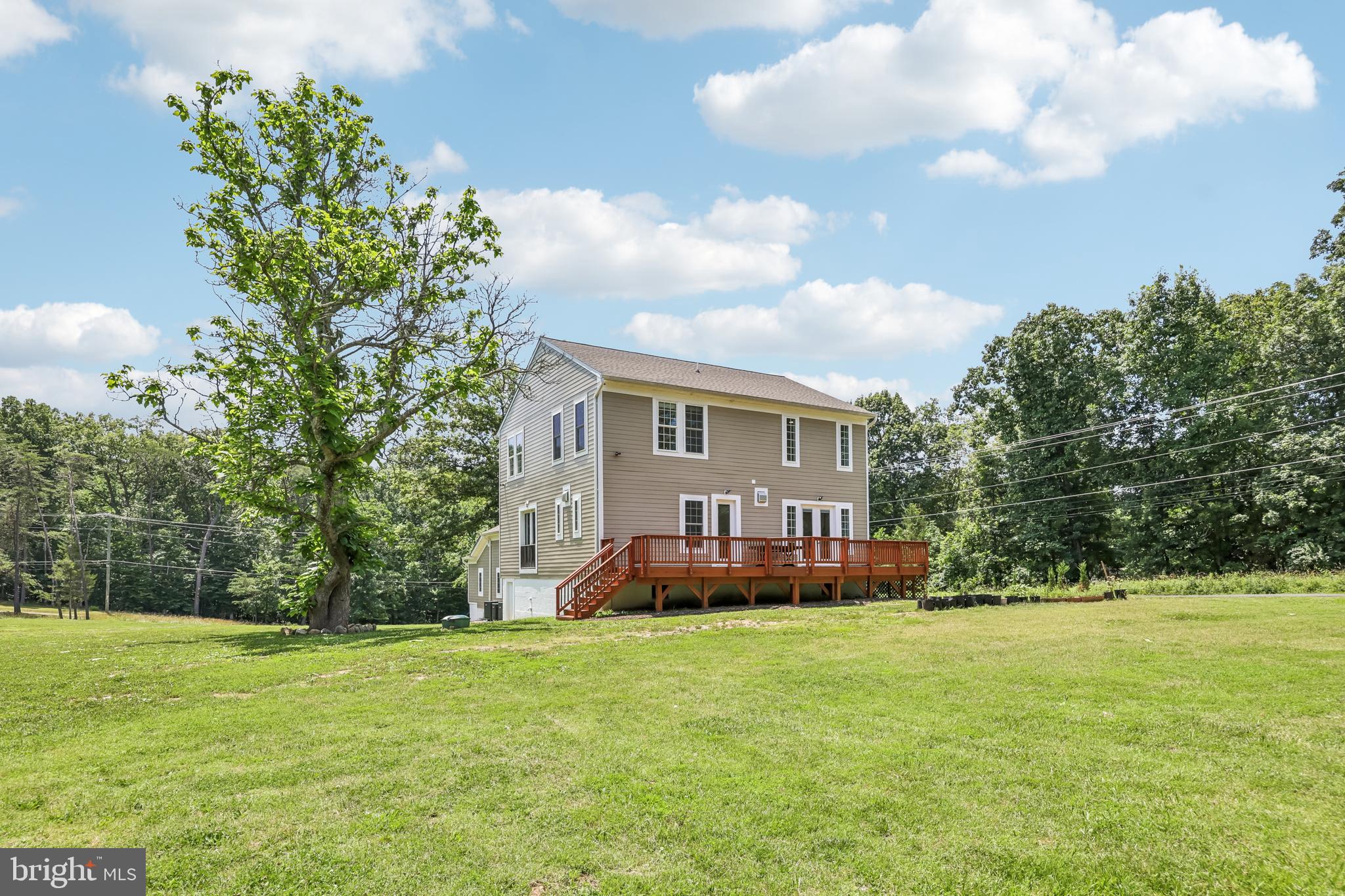 12304 Popes Head Road Fairfax, VA 22030 - Photo 75 of 78 a front view of house with yard and trees
