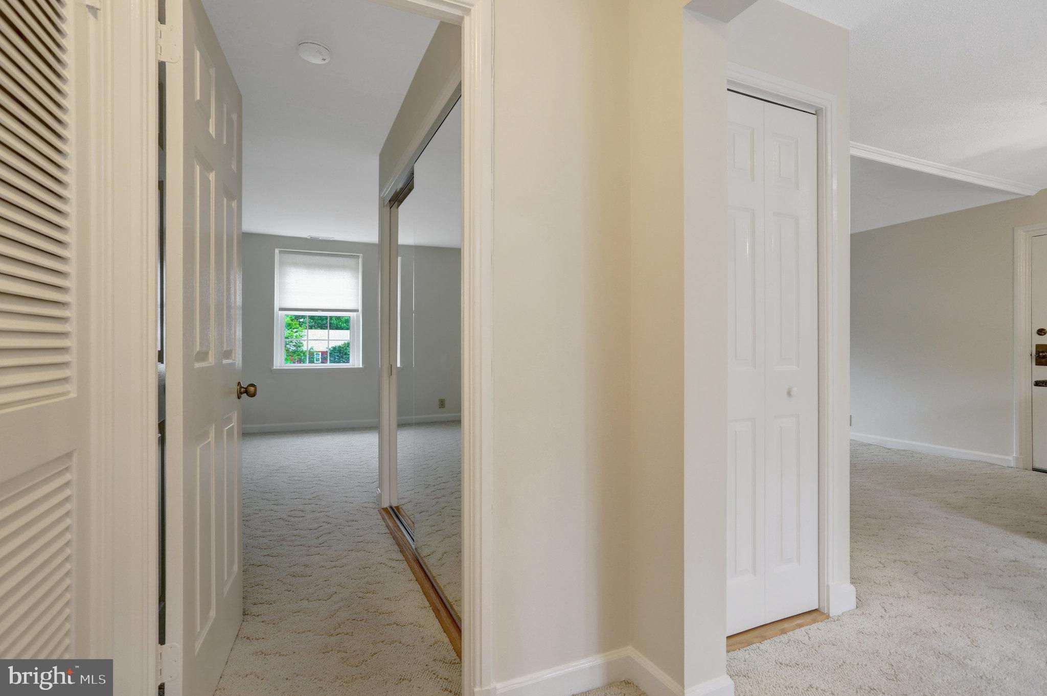 3062 South Buchanan Street, Unit C2 Arlington, VA 22206 - Photo 22 of 33 a view of a livingroom from a hallway
