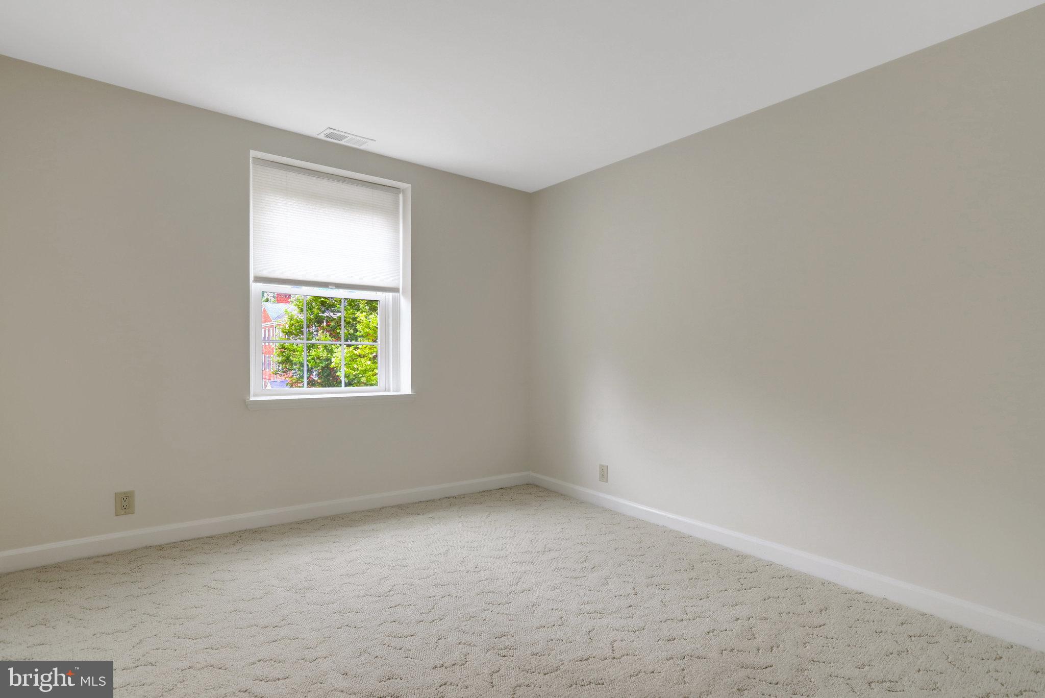 3062 South Buchanan Street, Unit C2 Arlington, VA 22206 - Photo 25 of 33 an empty room with a window