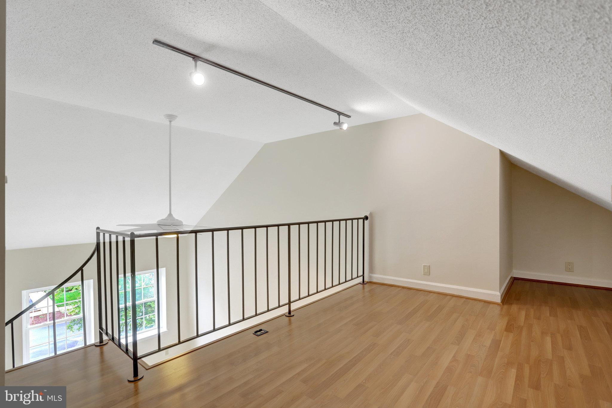 3062 South Buchanan Street, Unit C2 Arlington, VA 22206 - Photo 33 of 33 a view of a hallway with wooden floor