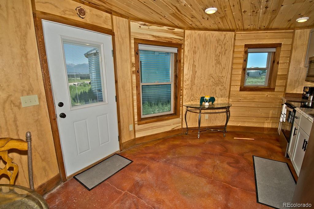 426 Shakedown Street Moffat, CO 81143 - Photo 5 of 17 a living room with chairs