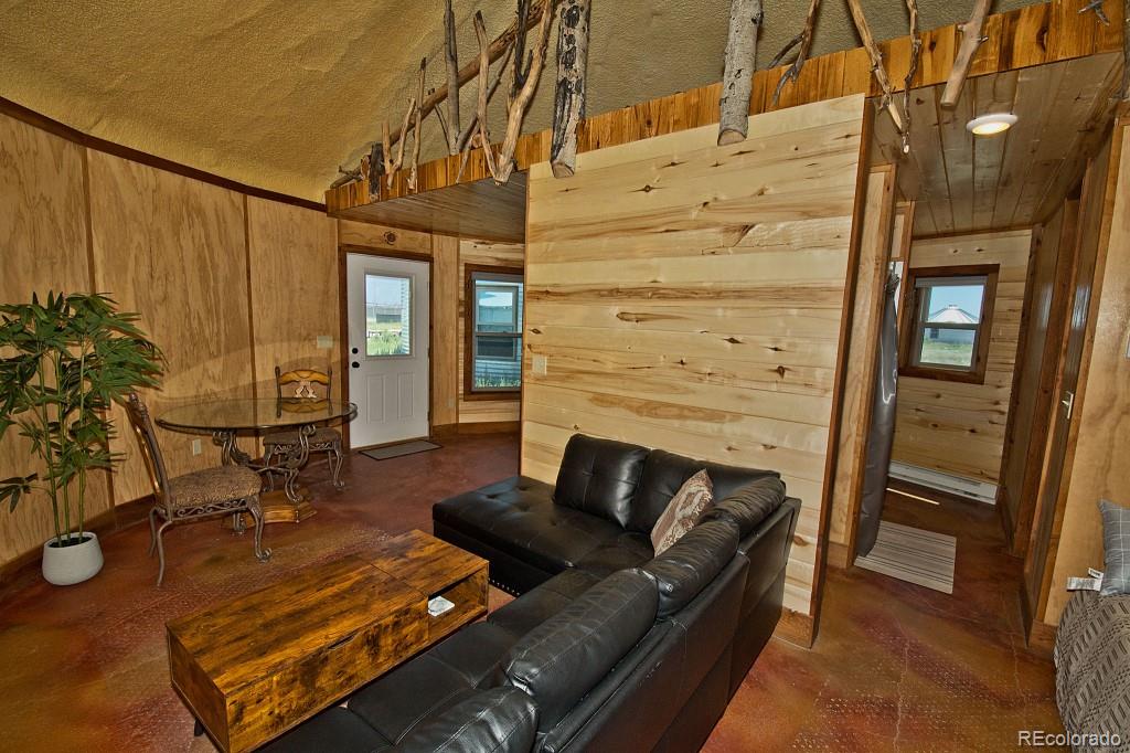 426 Shakedown Street Moffat, CO 81143 - Photo 10 of 17 a building outdoor space with patio furniture