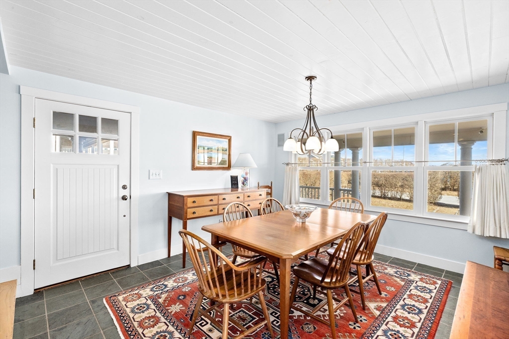 18 Collier Road Scituate, MA 02066 - Photo 12 of 40 a view of a dining room with furniture and window
