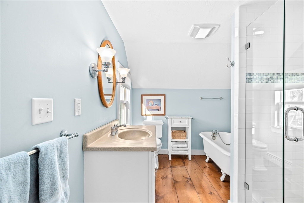18 Collier Road Scituate, MA 02066 - Photo 19 of 40 a bathroom with a sink and a mirror