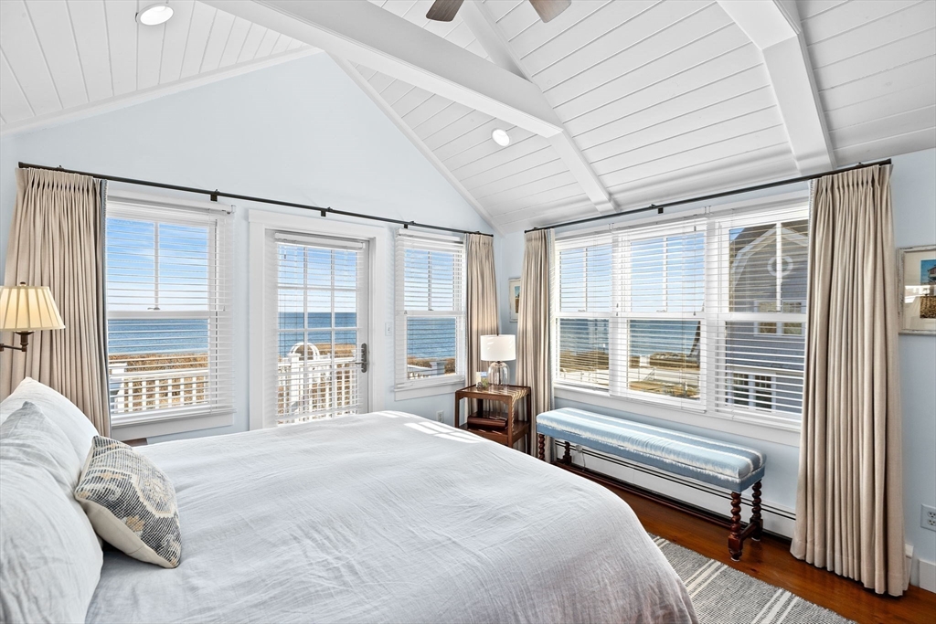 18 Collier Road Scituate, MA 02066 - Photo 23 of 40 a bedroom with a large bed and a large window