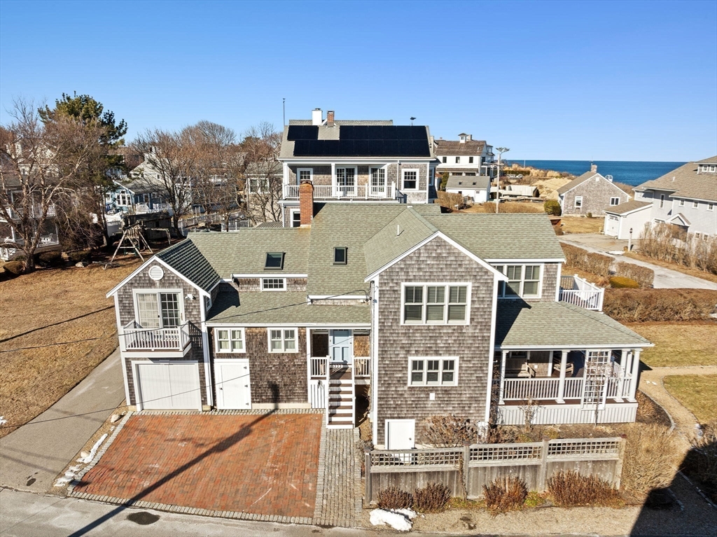 18 Collier Road Scituate, MA 02066 - Photo 36 of 40 a front view of a house with a ocean view