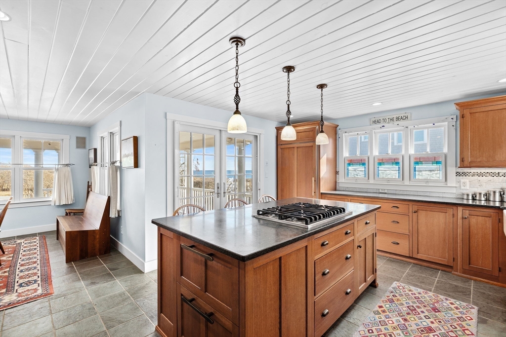 18 Collier Road Scituate, MA 02066 - Photo 9 of 40 a kitchen with sink stove and refrigerator