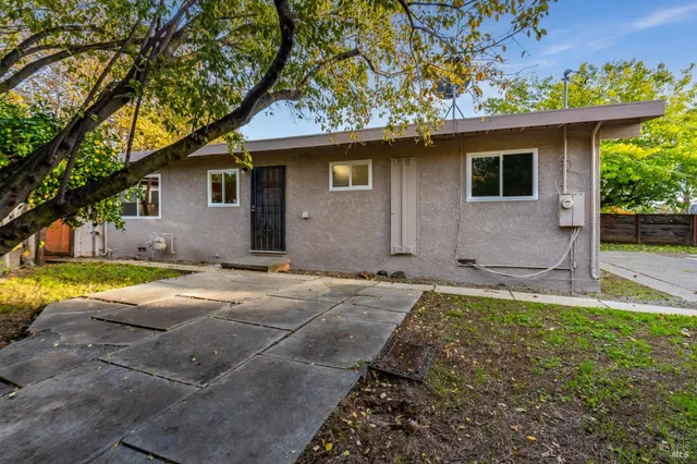 a house with yard in front of it