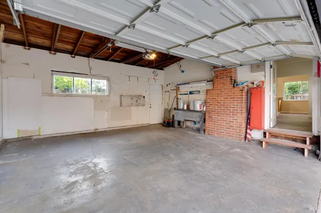 a view of a empty room with storage