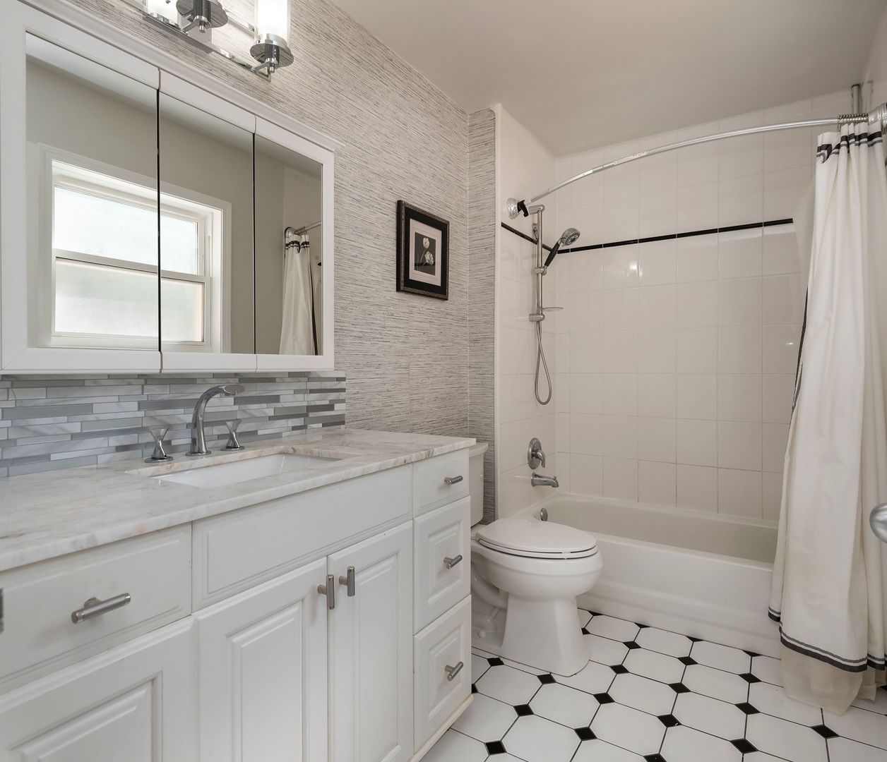 340 3rd Street Wheeling, IL 60090 - Photo 20 of 38 a bathroom with a granite countertop sink toilet and shower