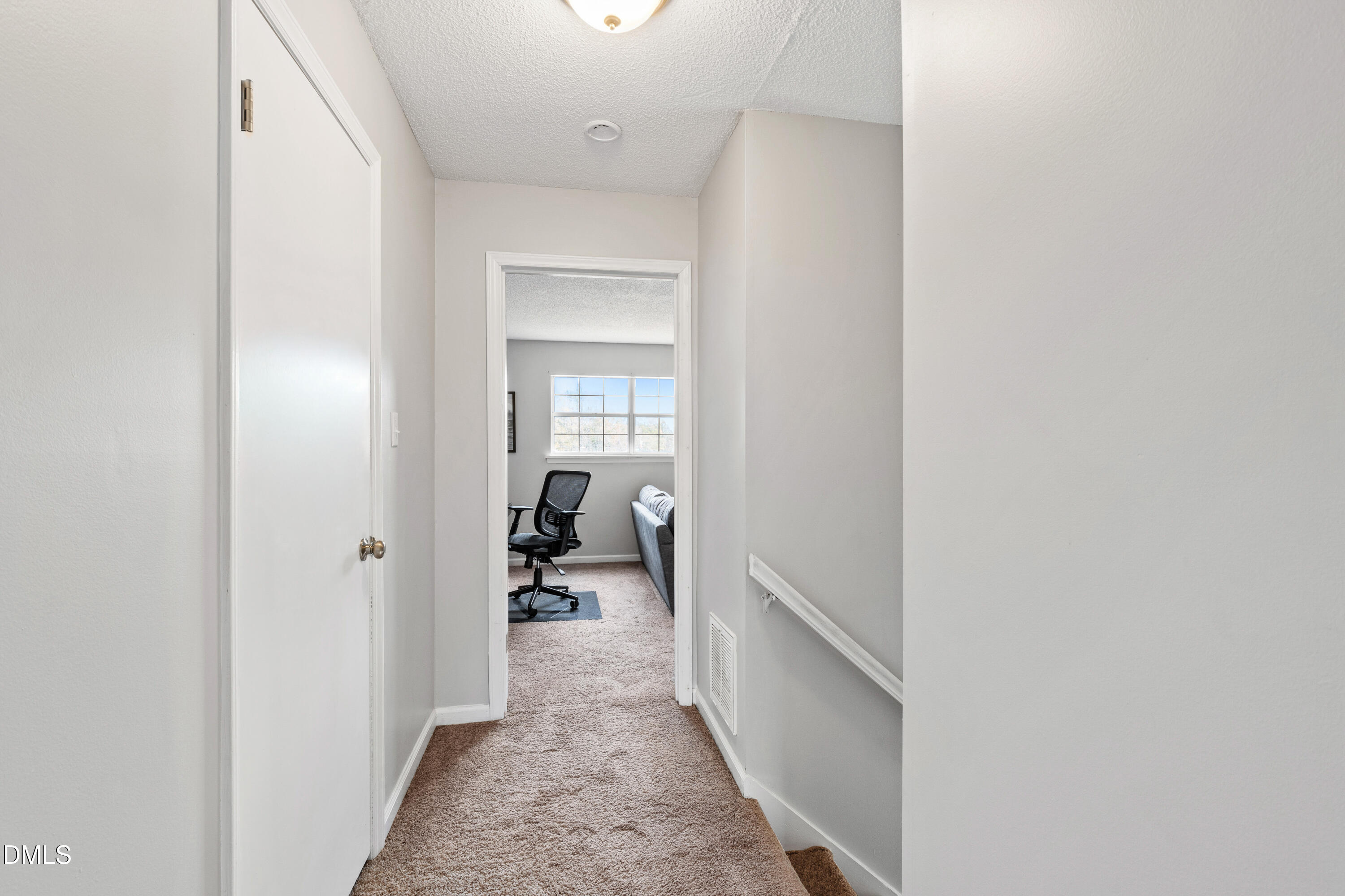 705 Felicia Street Durham, NC 27704 - Photo 23 of 37 a hall way with a bed