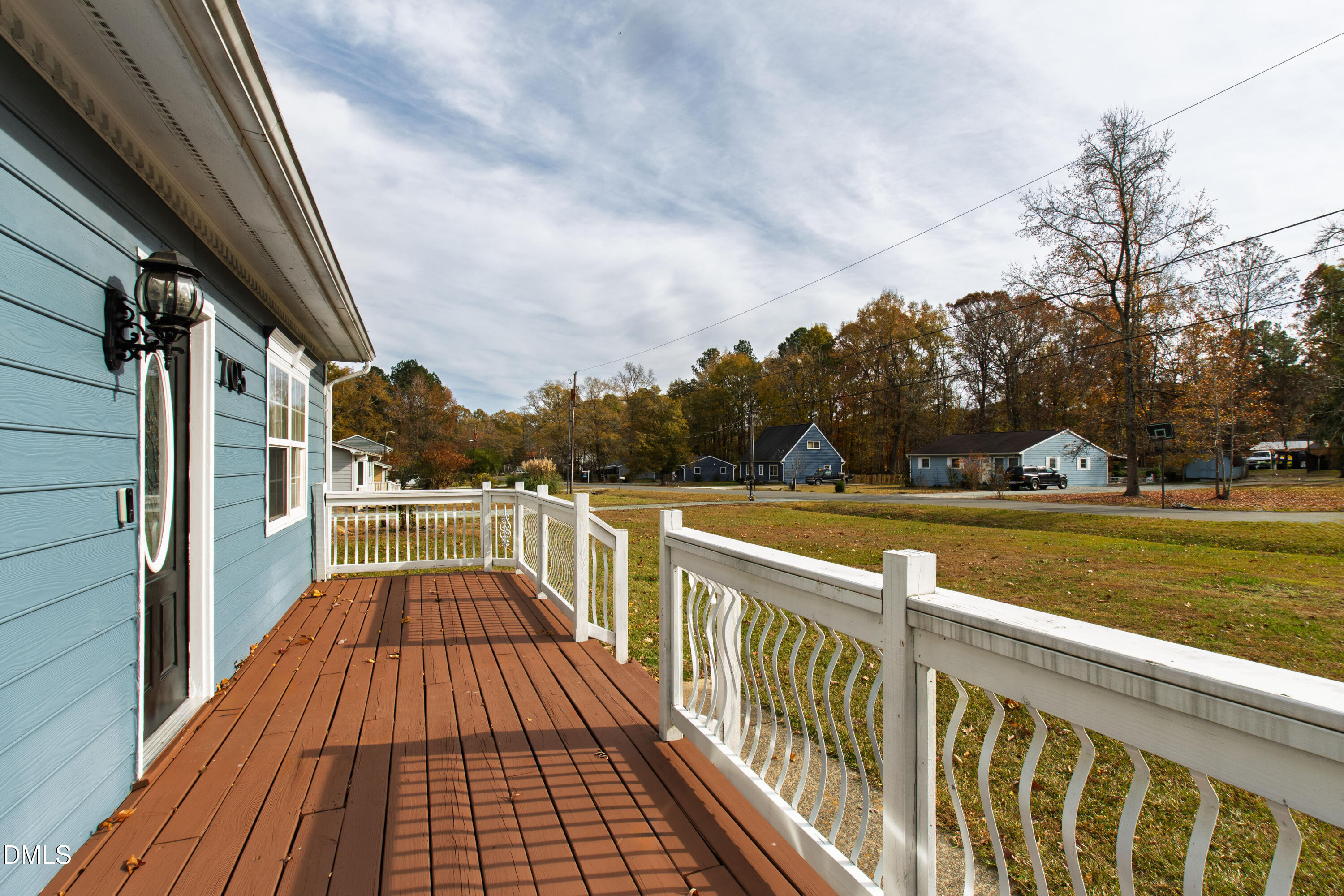 705 Felicia Street Durham, NC 27704 - Photo 5 of 37 a view of balcony with wooden floor and fence