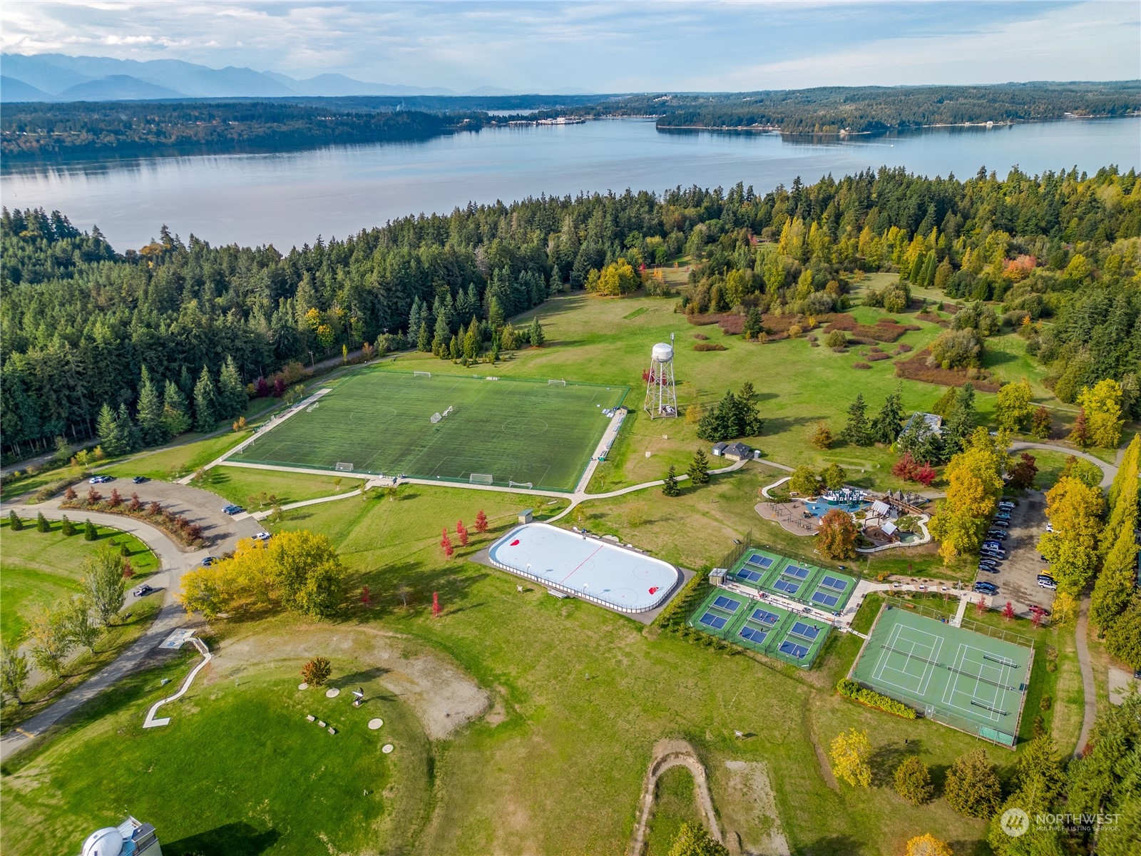 -ne Northeast N Tolo Road Bainbridge Island, WA 98110 - Photo 7 of 12 a view of a lake with a yard