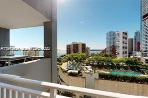 a view of a city with tall buildings