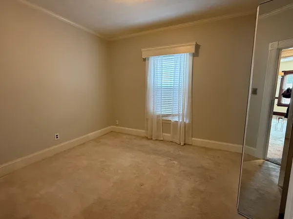 an empty room with window