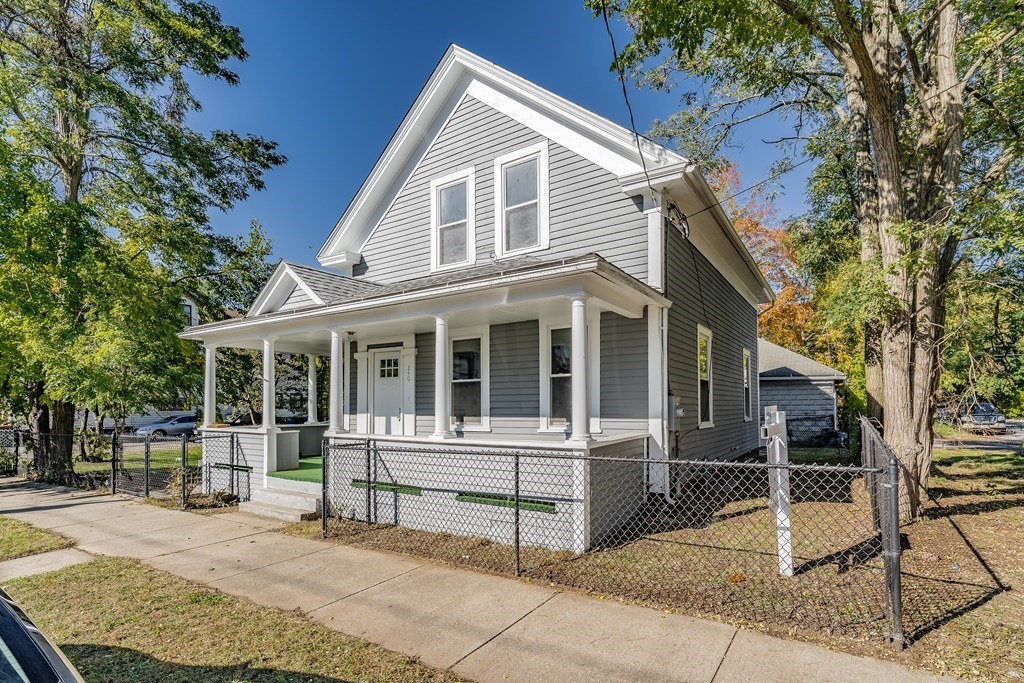 240 Centre Street Springfield, MA 01151 - Photo 1 of 23 a view of house with a yard and sitting area
