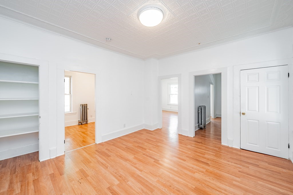 240 Centre Street Springfield, MA 01151 - Photo 7 of 23 a view of empty room with wooden floor