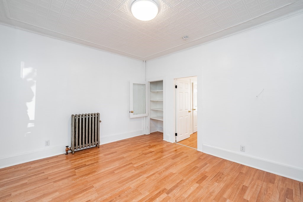 240 Centre Street Springfield, MA 01151 - Photo 9 of 23 a view of empty room with wooden floor