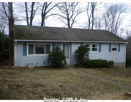 8 Wildwood Road Torrington, CT 06790 - Photo 1 of 1 a view of a house with a yard