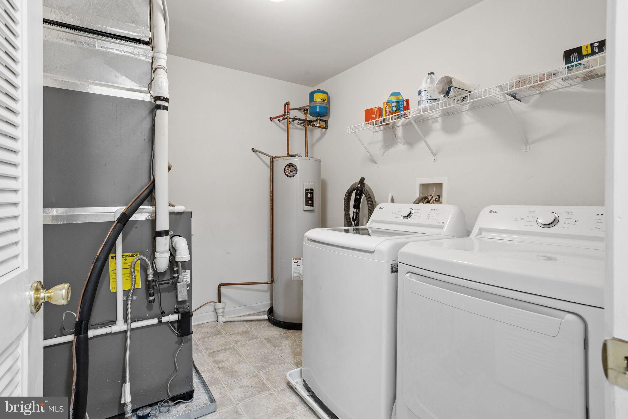 19 Fox Court Riverside, NJ 08075 - Photo 19 of 23 a view of storage and utility room with washer and dryer