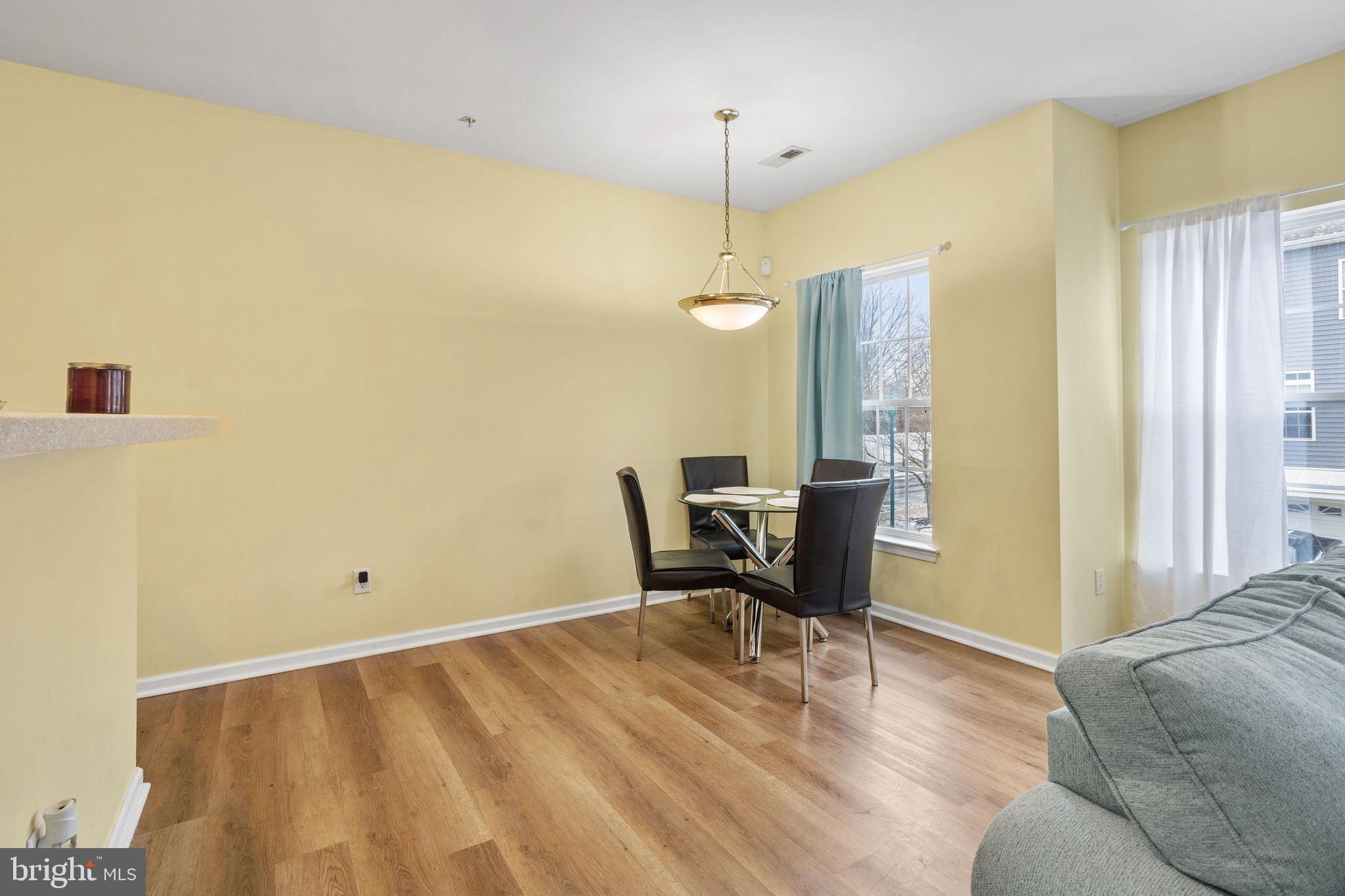 19 Fox Court Riverside, NJ 08075 - Photo 4 of 23 a view of a workspace with furniture and a window