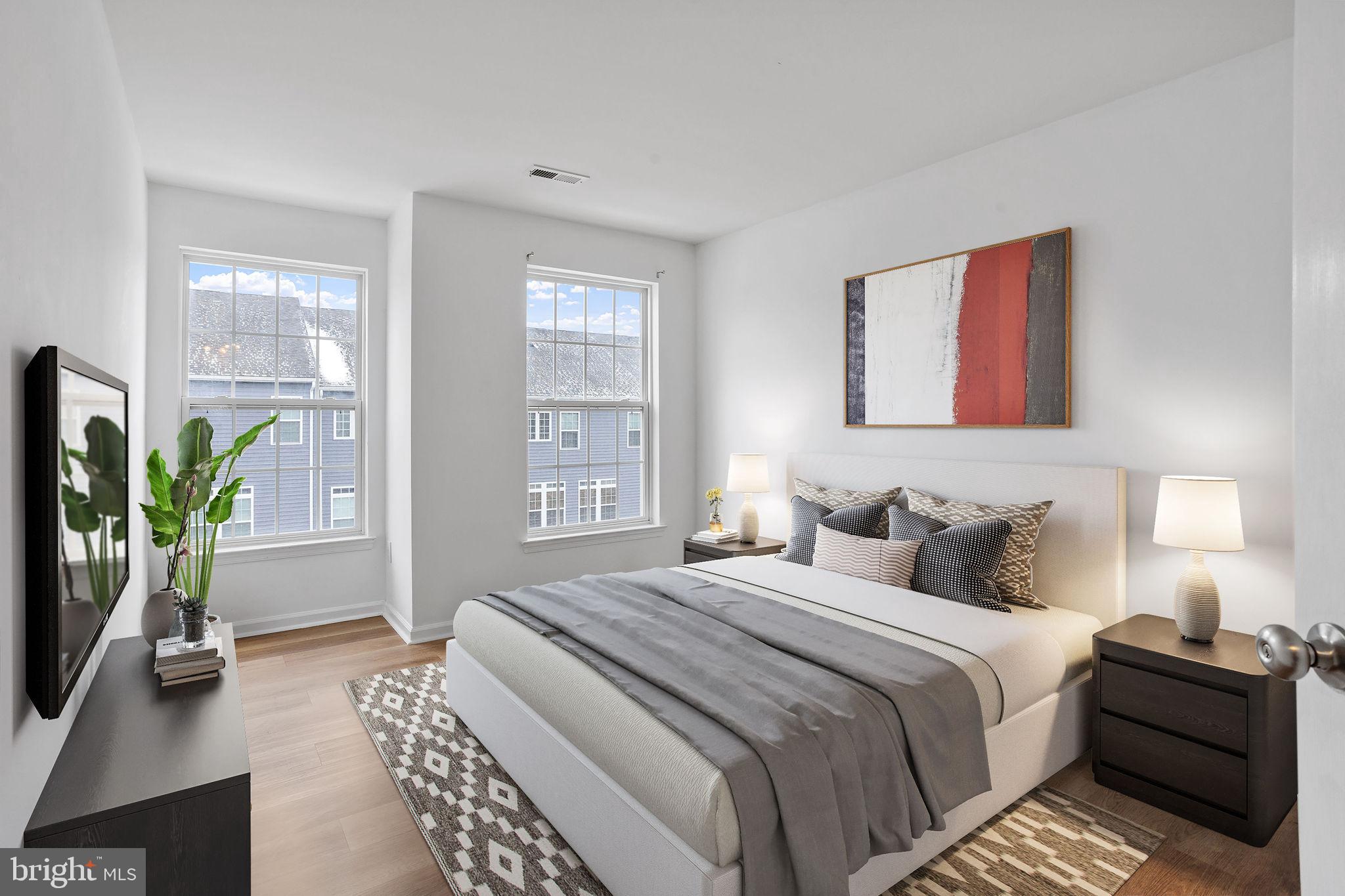 19 Fox Court Riverside, NJ 08075 - Photo 8 of 23 a bedroom with a bed table and a window