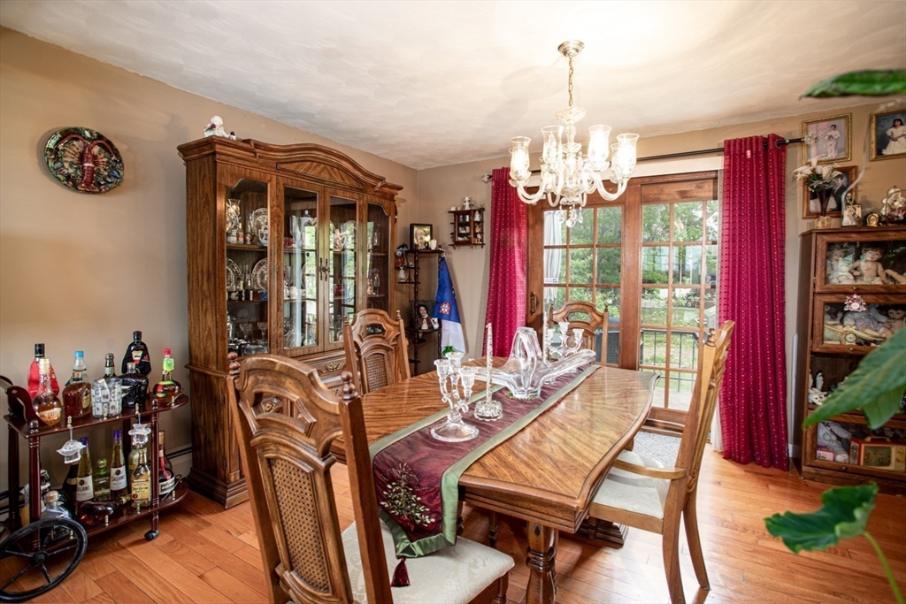 166 Stonehaven Road Fall River, MA 02723 - Photo 7 of 33 a view of a dining room with furniture window and wooden floor