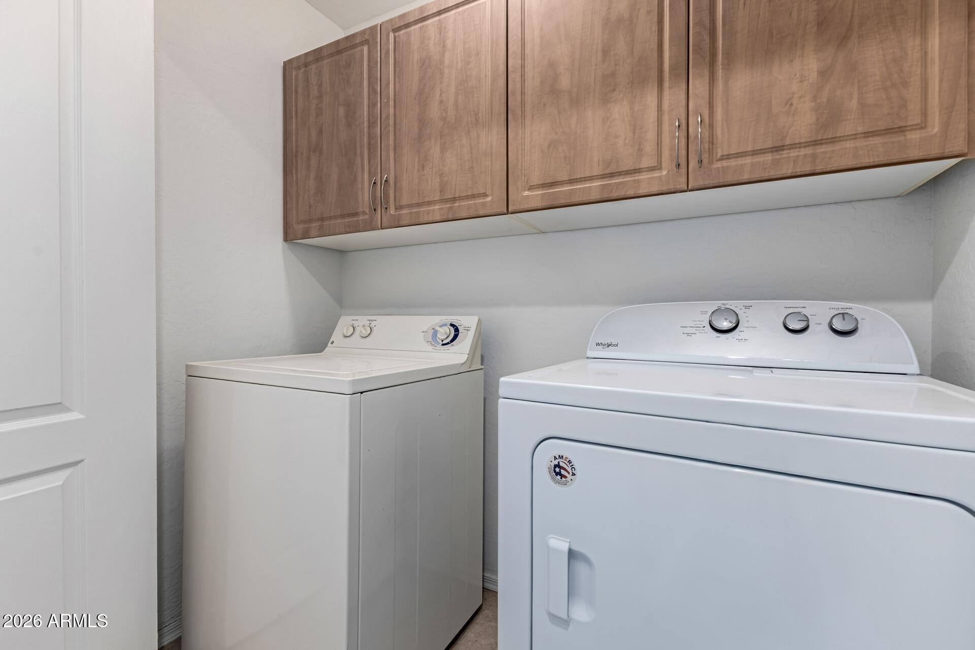 705 West Queen Creek Road, Unit 1167 Chandler, AZ 85248 - Photo 24 of 31 a utility room with dryer and washer