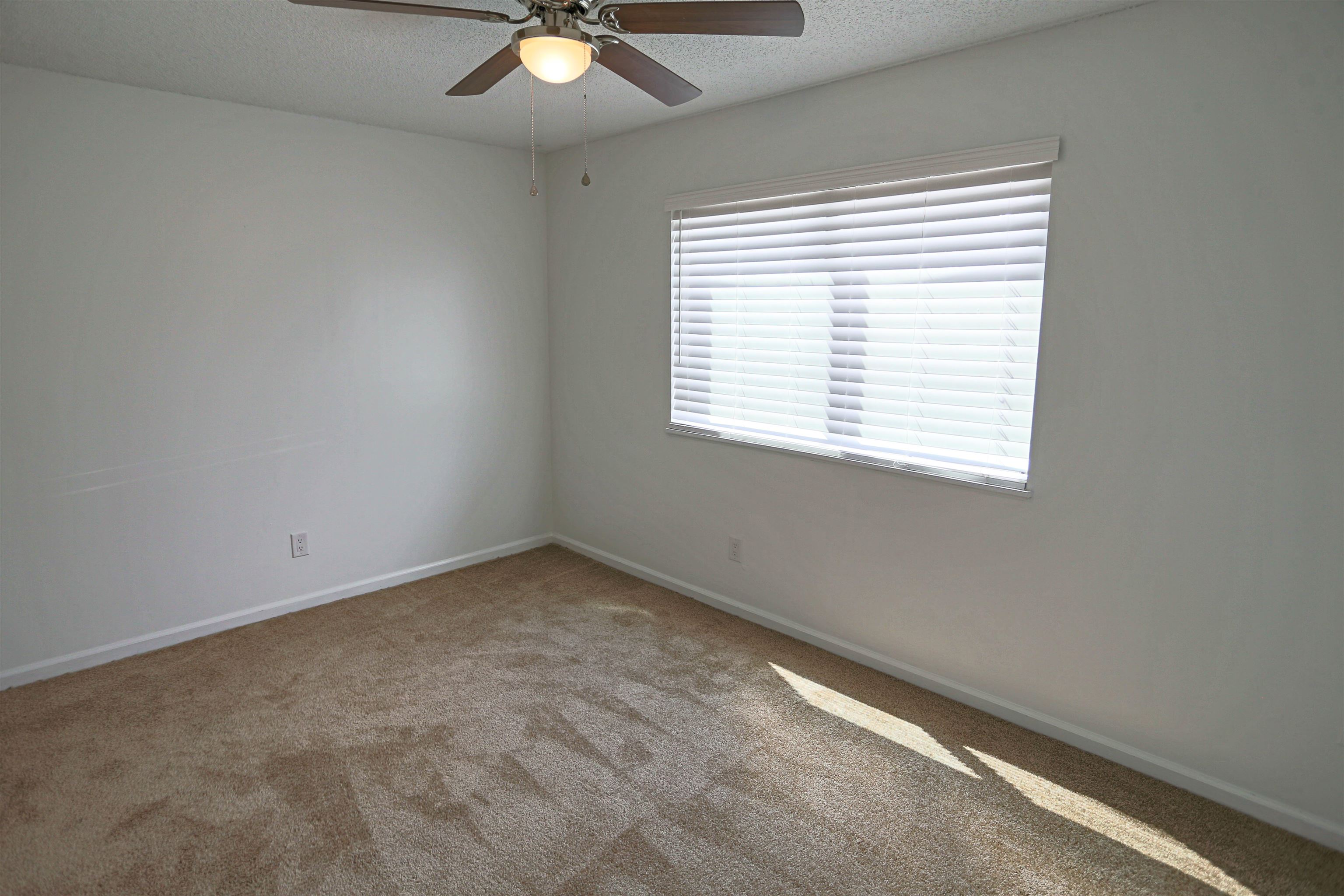 3765 Crown Point Road, Unit 4 Jacksonville, FL 32257 - Photo 21 of 27 an empty room with a window