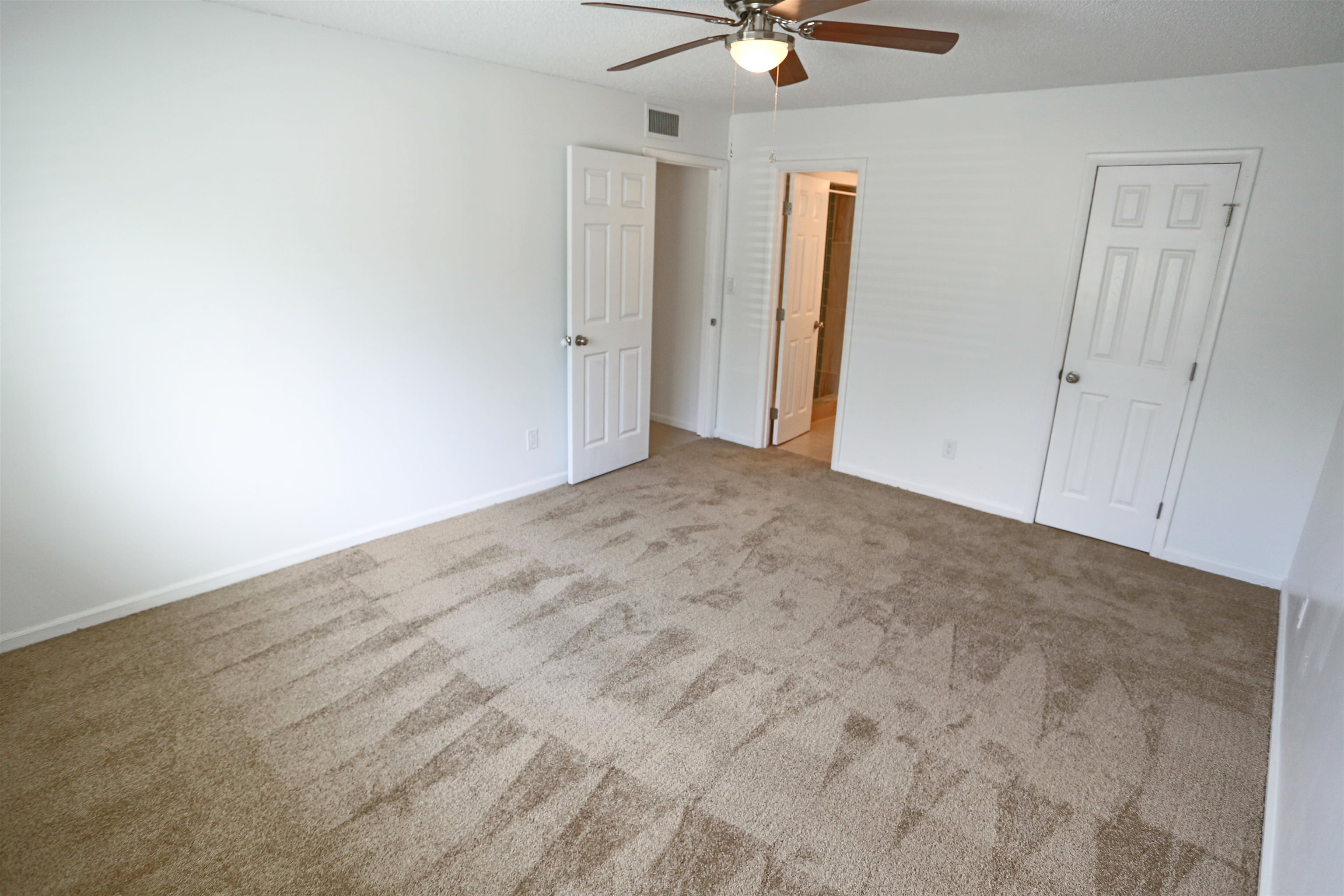 3765 Crown Point Road, Unit 4 Jacksonville, FL 32257 - Photo 25 of 27 wooden floor in an empty room
