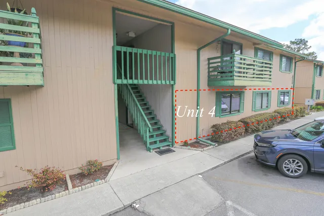 a car parked in front of a house