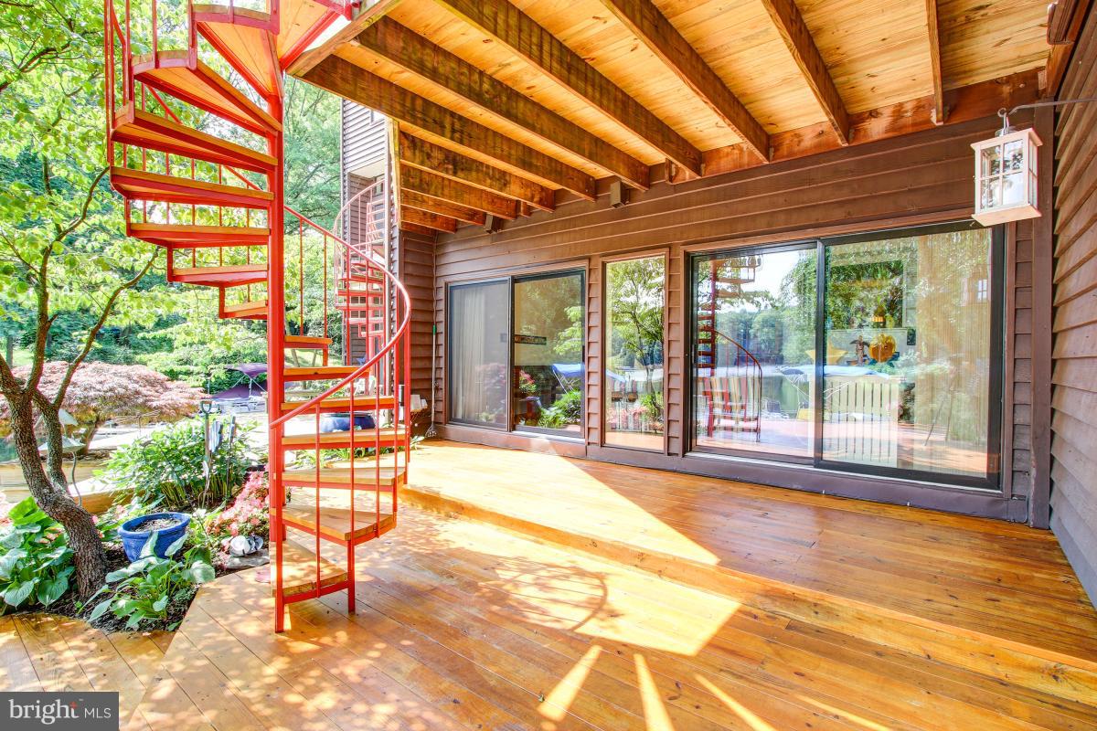 2016 Turtle Pond Drive Reston, VA 20191 - Photo 25 of 30 Spiral staircase connects upper & lower decks
