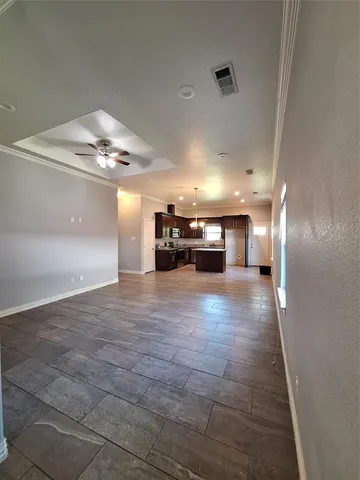 a view of livingroom with kitchen