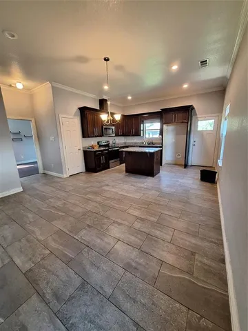 a view of a kitchen with a sink