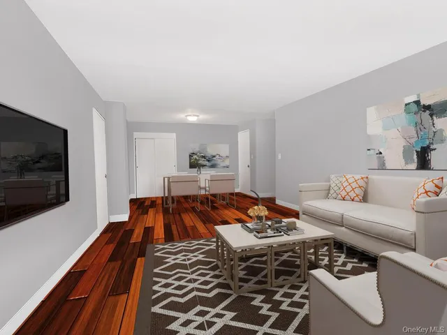 a living room with a couch and a flat screen tv