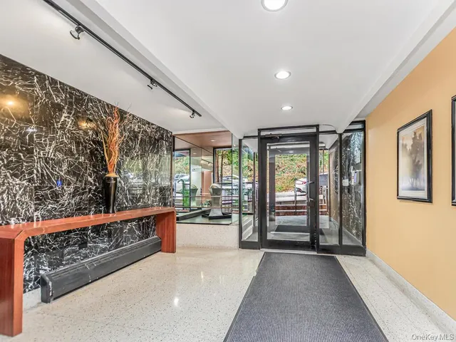 a view of an entryway with a balcony