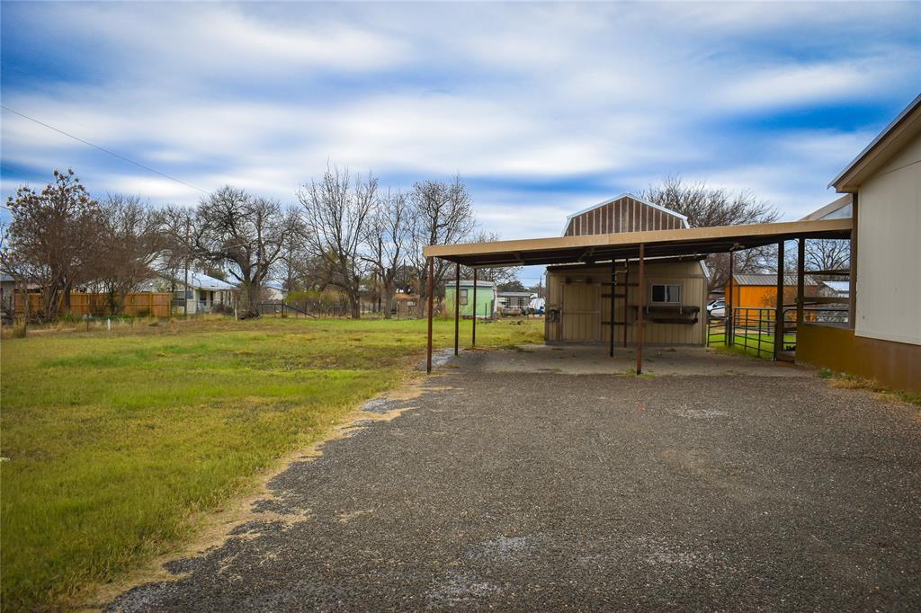 1301 East Pontotoc Street Mason, TX 76856 - Photo 5 of 26 a view of a house with a yard