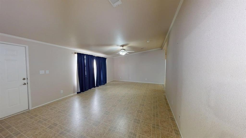 1301 East Pontotoc Street Mason, TX 76856 - Photo 10 of 26 a view of an empty room with closet and wooden floor