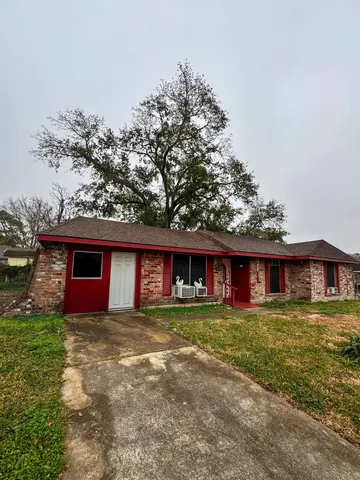 front view of a house with a big yard