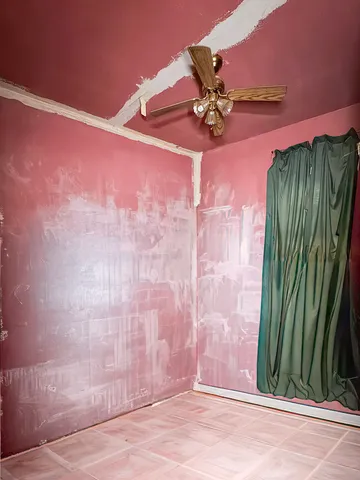 a kitchen with a sink cabinets and window