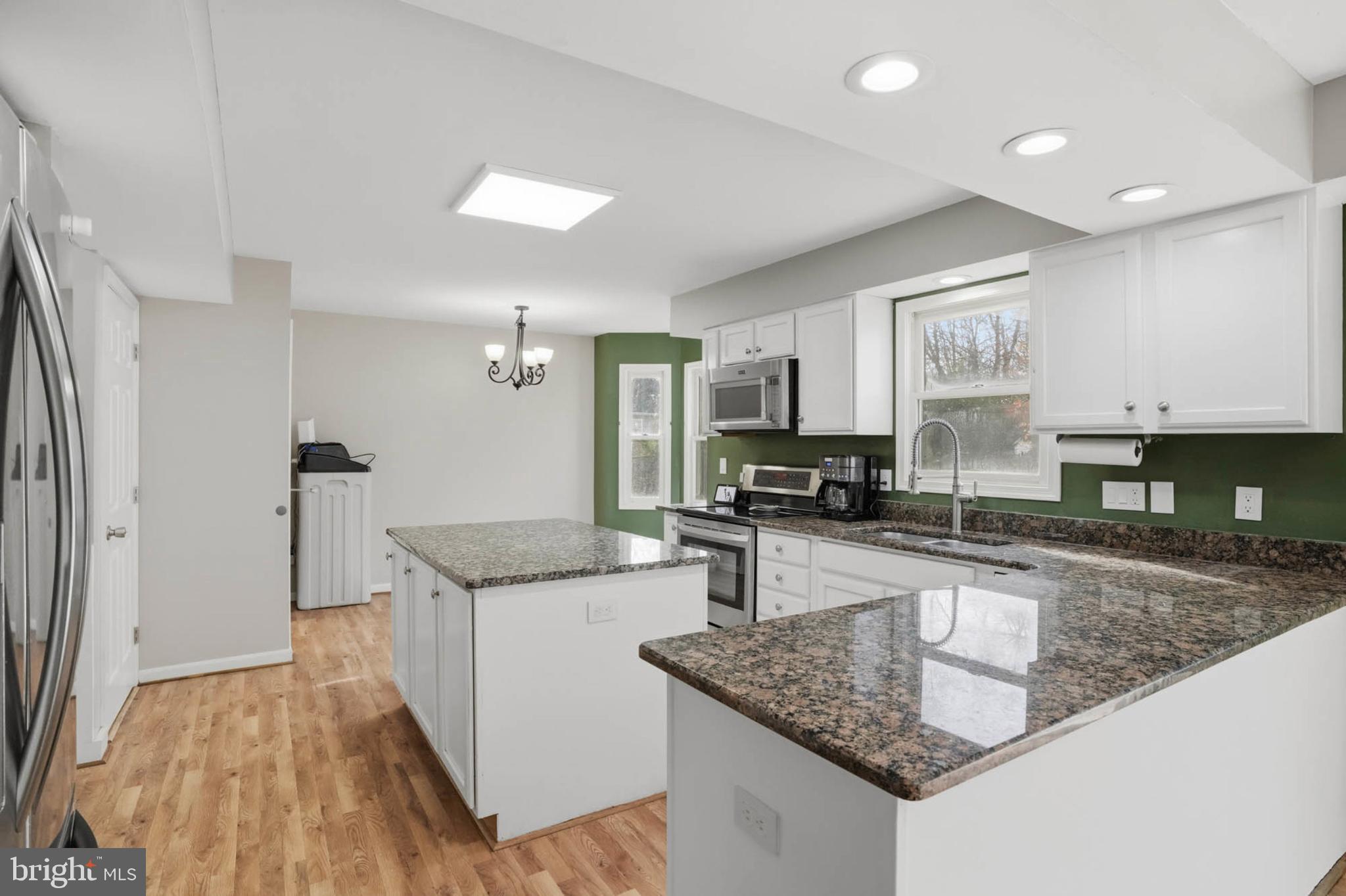 4742 Chestnut Road Shady Side, MD 20764 - Photo 11 of 41 Modern kitchen with sleek finishes.
