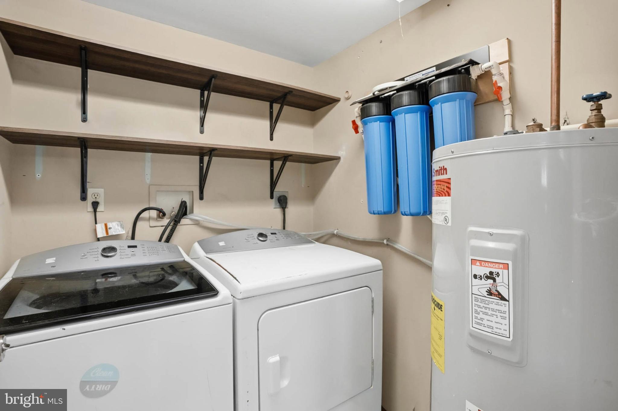 4742 Chestnut Road Shady Side, MD 20764 - Photo 15 of 41 Functional laundry space with ample storage.