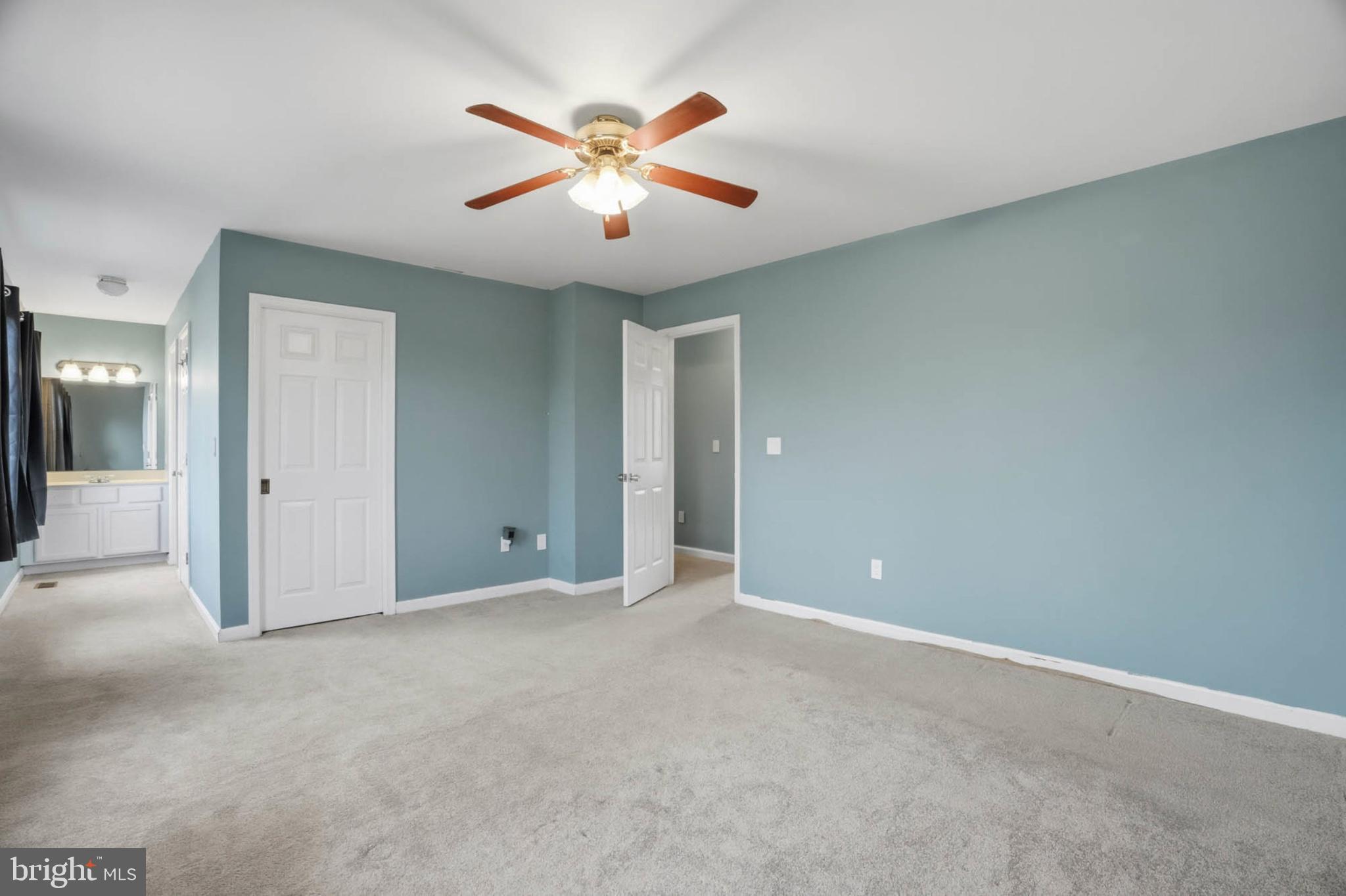 4742 Chestnut Road Shady Side, MD 20764 - Photo 19 of 41 Spacious room with calming blue walls.